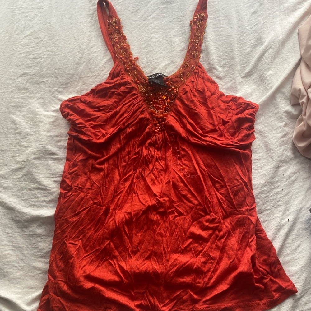 Orange blouse shirt?